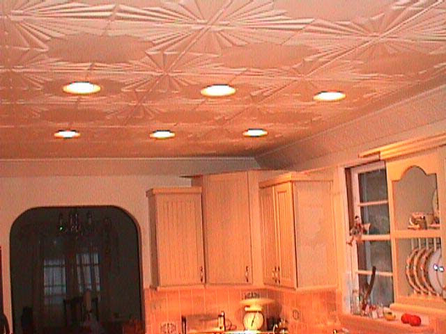 Tin ceiling in main kitchen, also in pool house and upstairs bath